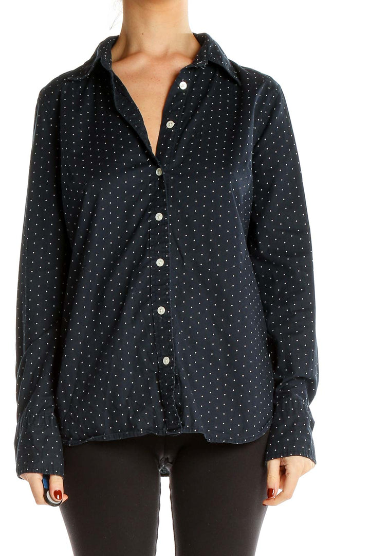 Front view of J.Crew navy button-up shirt with white polka dots