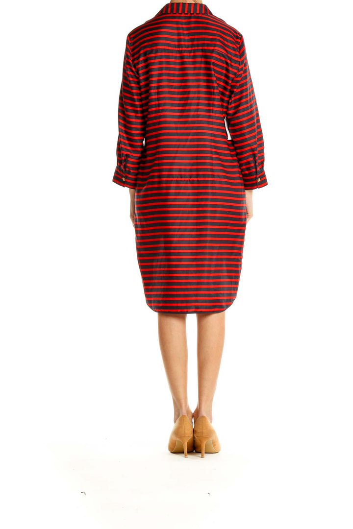 Side view of Red and Black Striped Button-Down Shirt Dress from The Limited