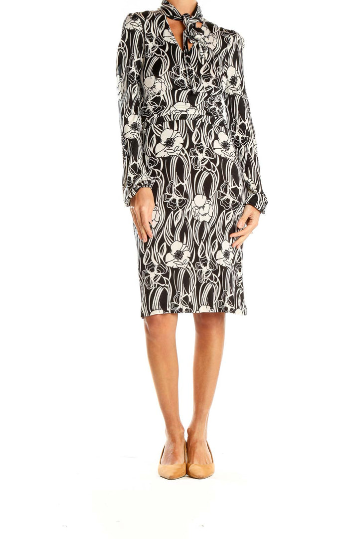 Front view of Banana Republic black and white floral print silk dress with tie neck detail