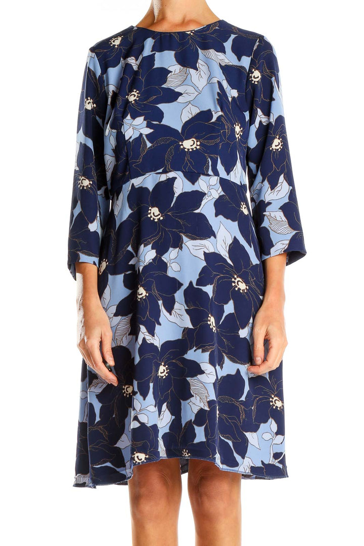 Front view of Ann Taylor Petites blue floral print shift dress with navy and light blue pattern