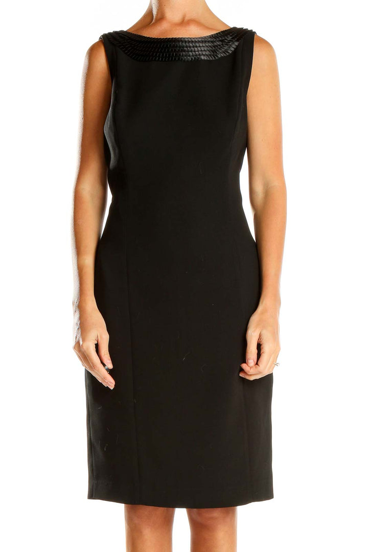 Front view of Calvin Klein black sleeveless sheath dress with textured neckline