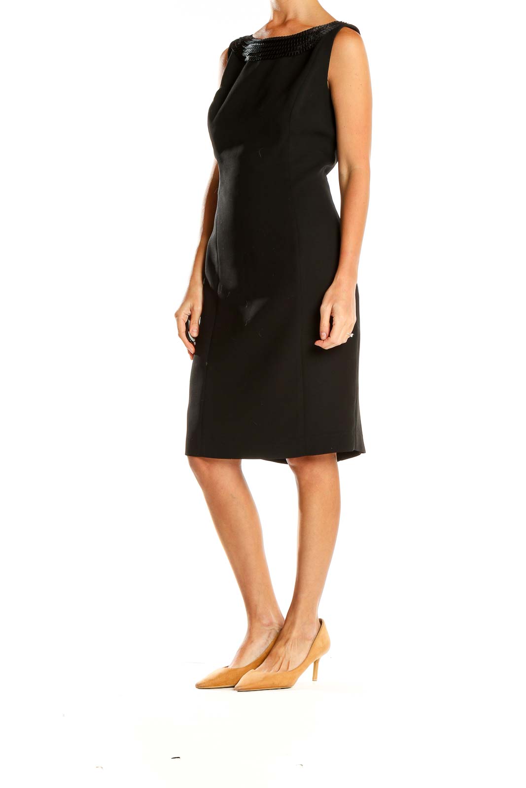 Front view of Calvin Klein black sleeveless sheath dress with textured neckline