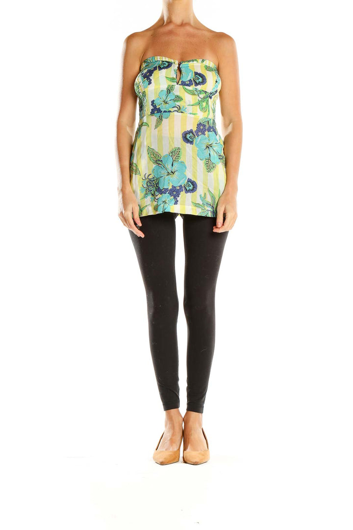 Front view of Free People Yellow Floral Strapless Top with striped background and turquoise flowers