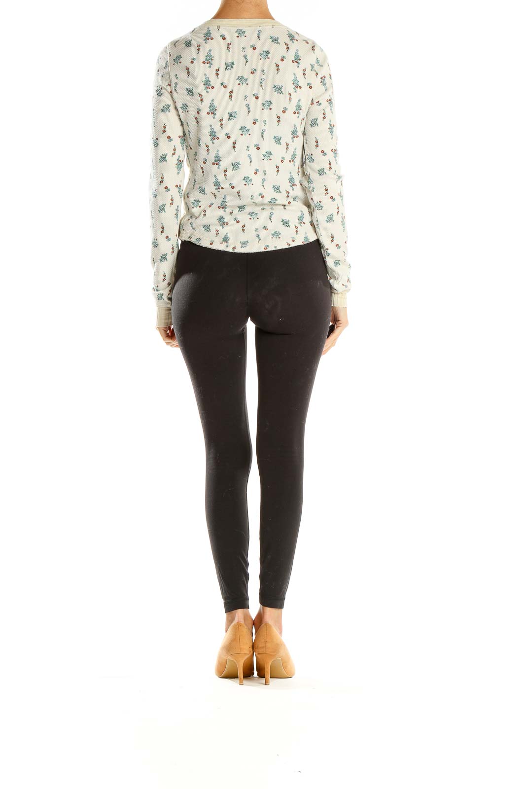 Back view of Free People cream floral waffle knit henley top showing all-over floral print