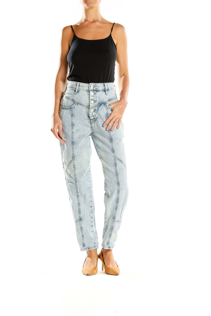 Front view of Free People light blue acid wash high-waisted jeans with paneled design