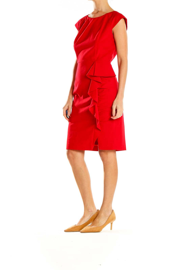 Front view of red Calvin Klein sheath dress with side ruffle detail