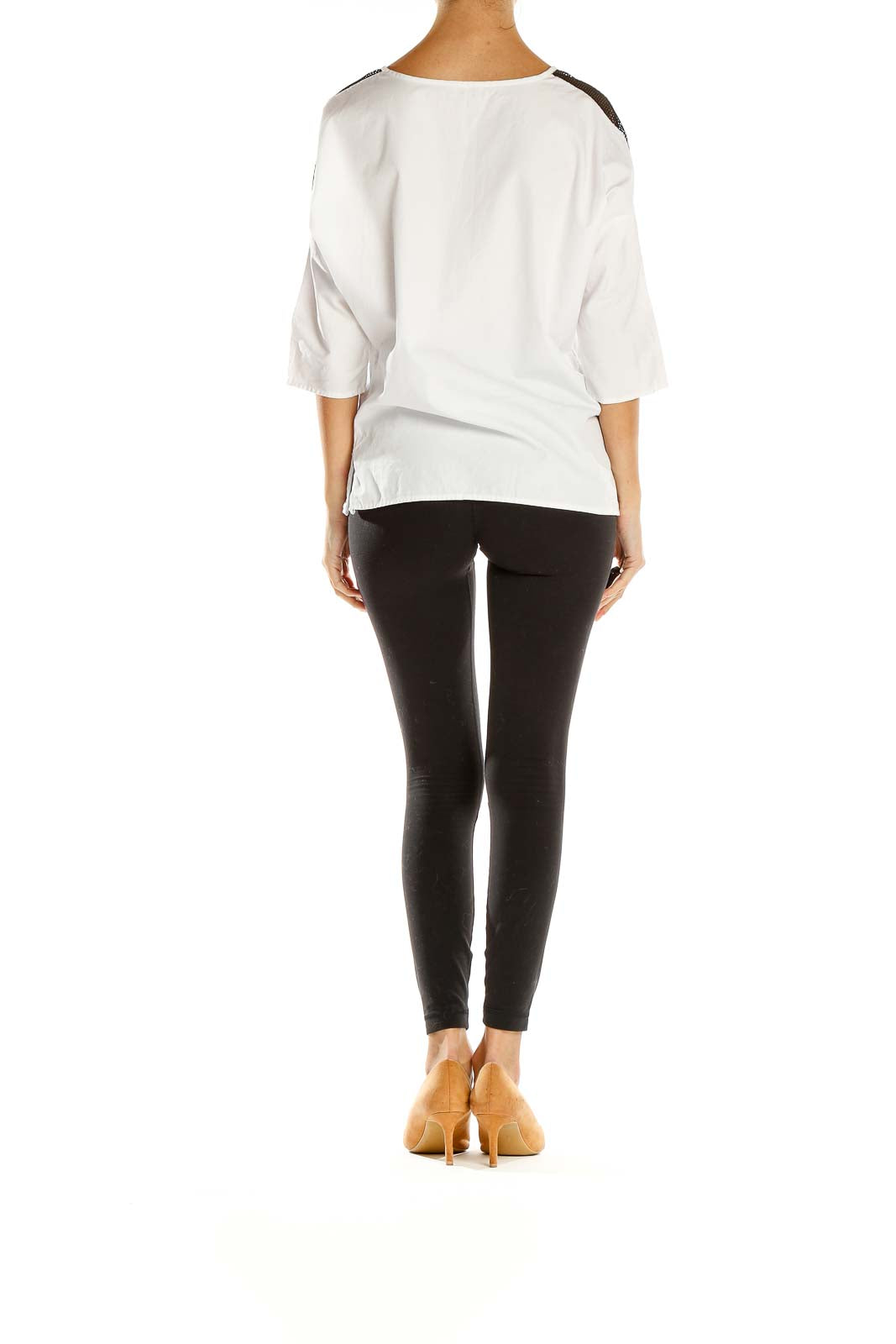 Side view of white Ammara boatneck blouse showing relaxed fit