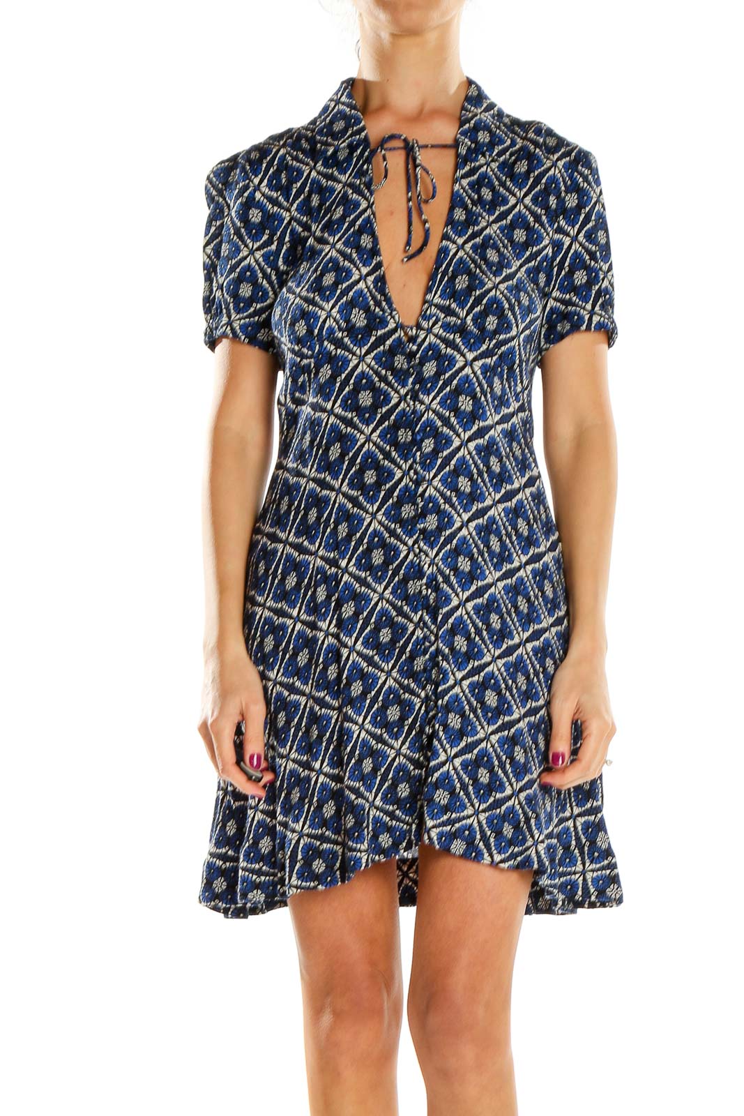 Front view of Free People blue geometric print mini dress with V-neckline and tie detail