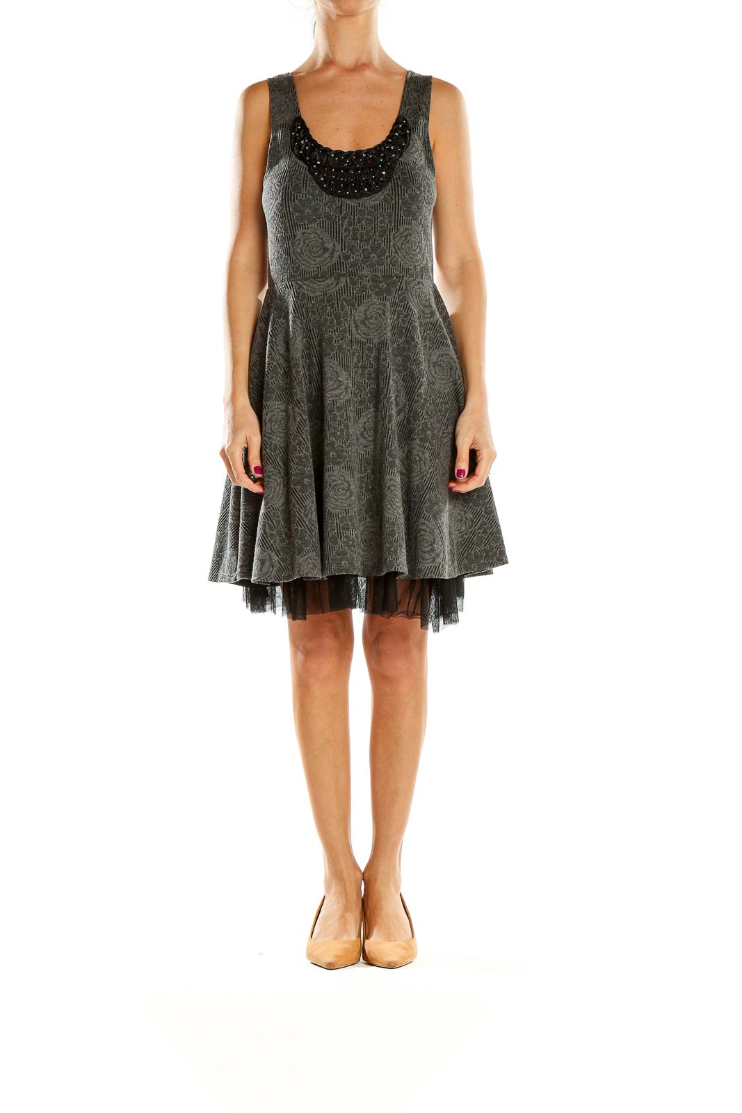 Front view of gray Free People fit-and-flare dress with embossed floral pattern and beaded neckline