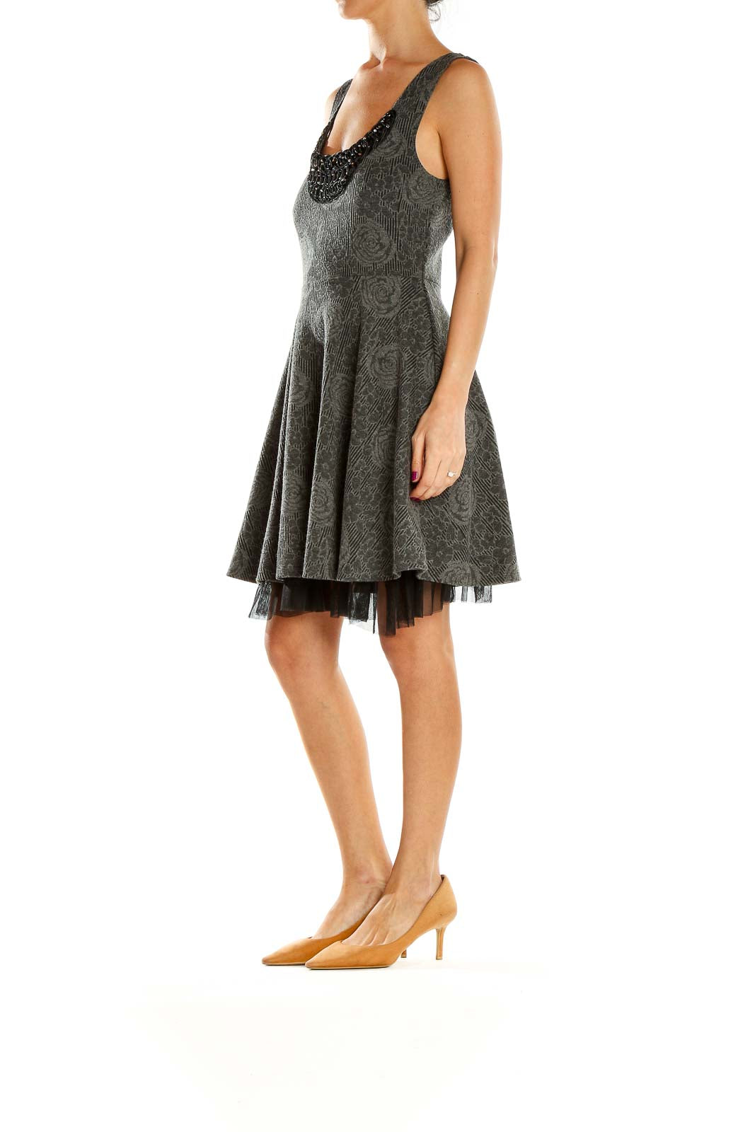 Front view of gray Free People fit-and-flare dress with embossed floral pattern and beaded neckline