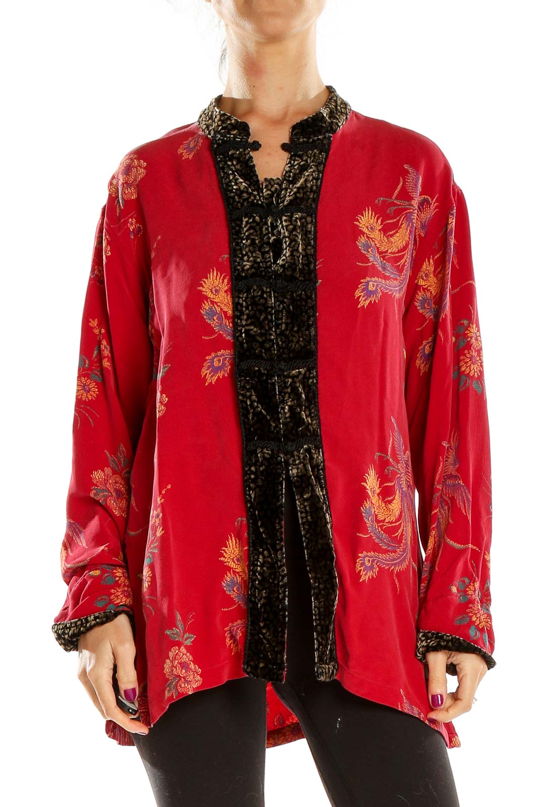 Front view of red silk jacket with floral embroidery and black velvet trim