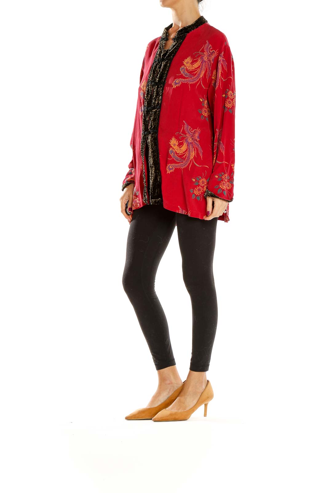 Front view of red silk jacket with floral embroidery and black velvet trim