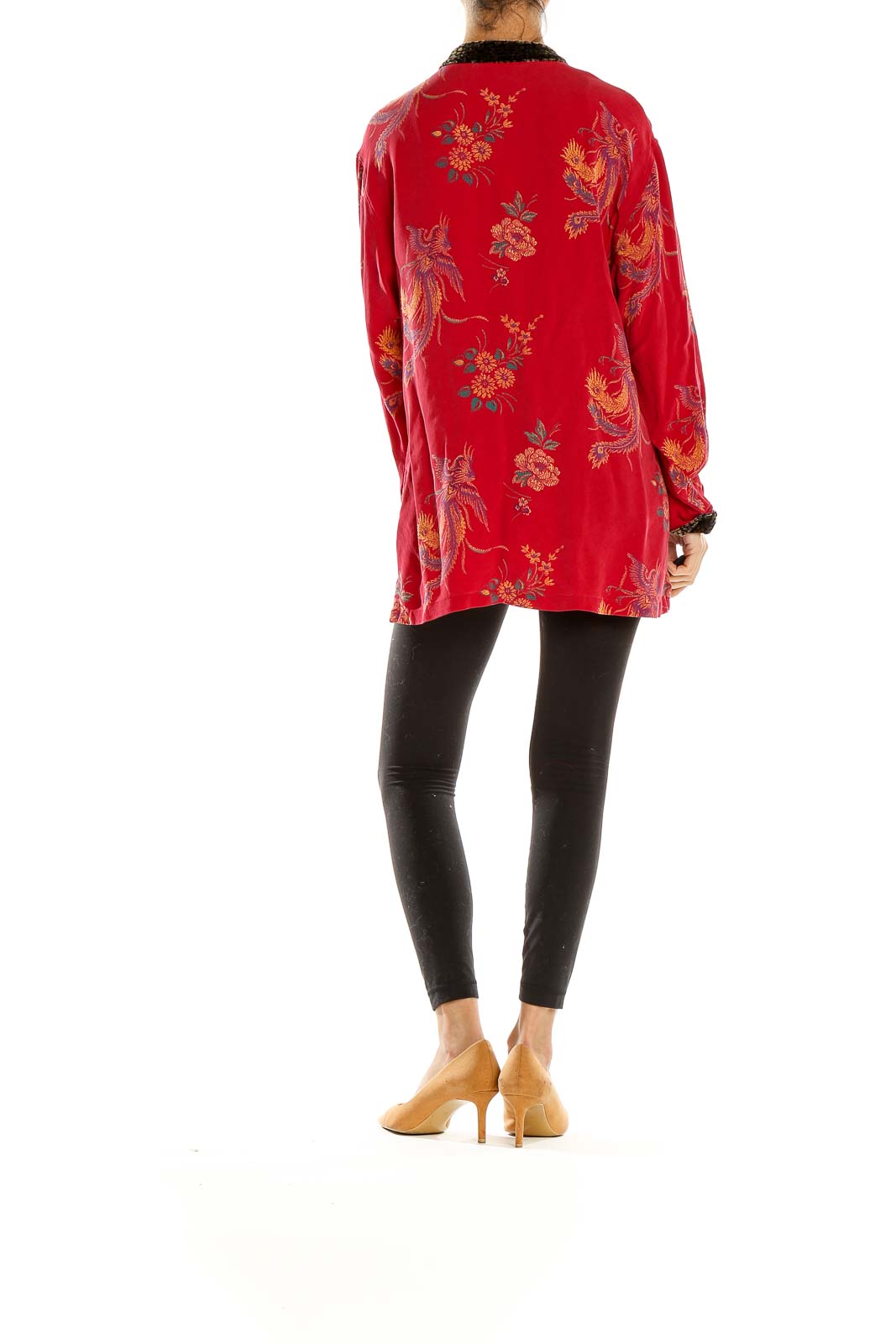 Side view of red embroidered silk jacket with black inner layer