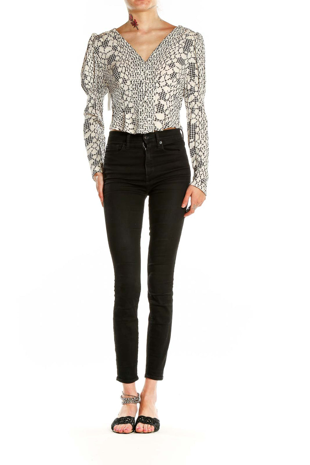 Front view of Free People Black and White Floral Lace Crop Top with puff sleeves