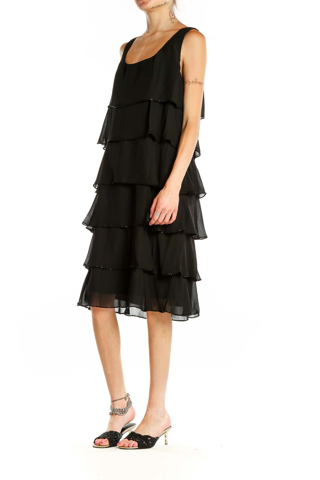 Front view of Patra black tiered chiffon cocktail dress with sequin trim