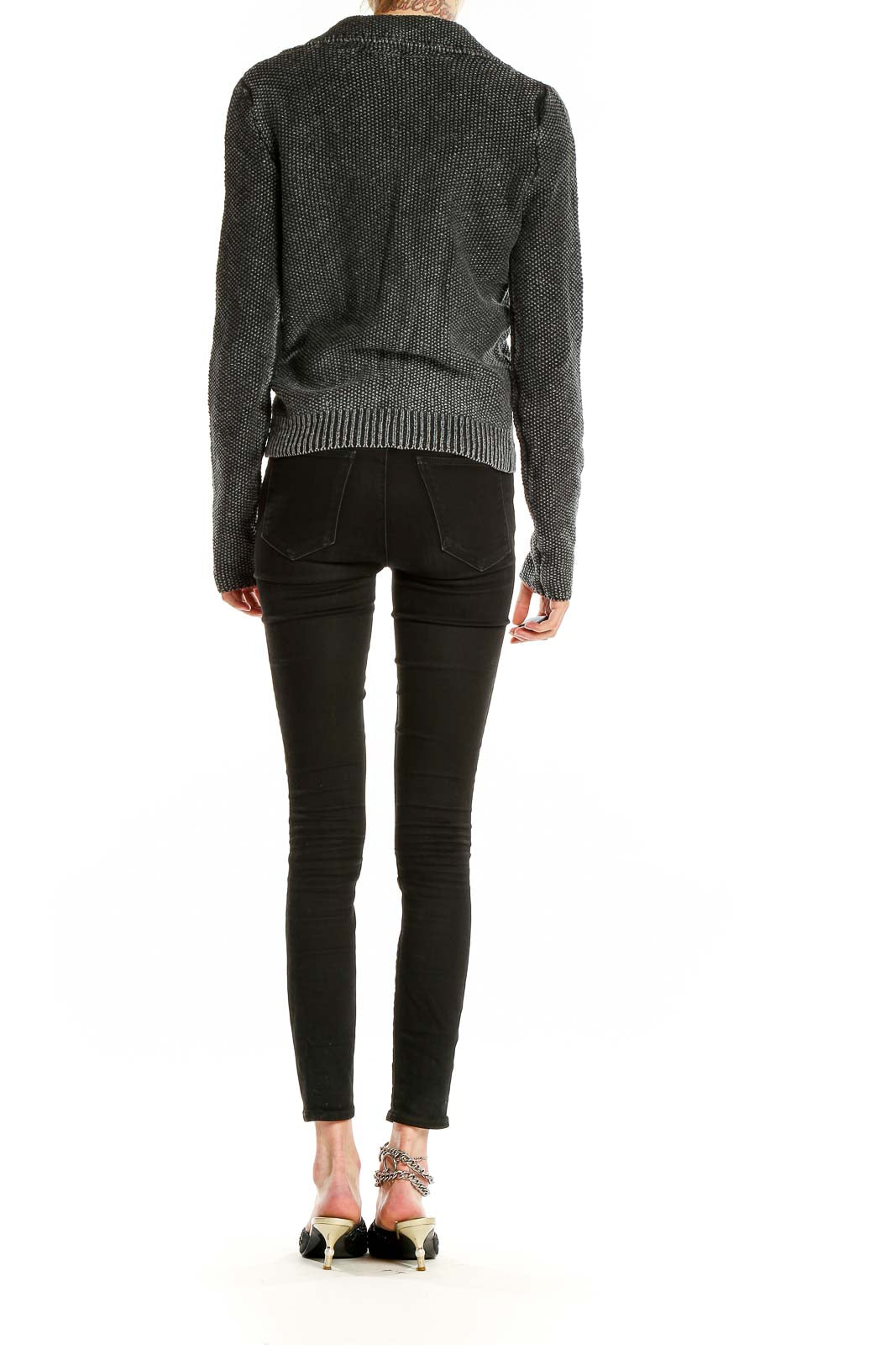 Back view of Free People gray knit moto-style sweater showing textured fabric