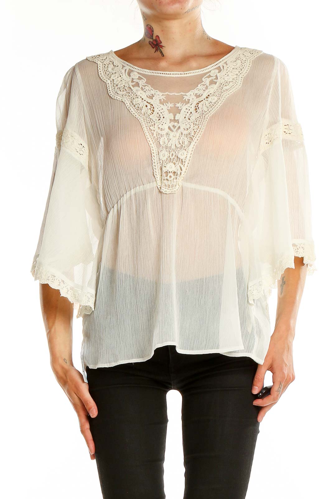 Front view of white sheer lace-trimmed boho blouse from Free People