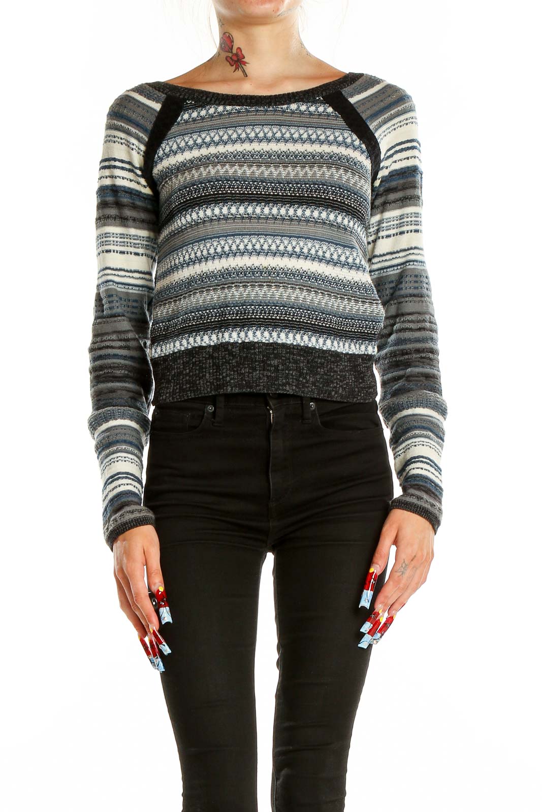 Front view of Free People Blue Striped Cropped Knit Sweater on model