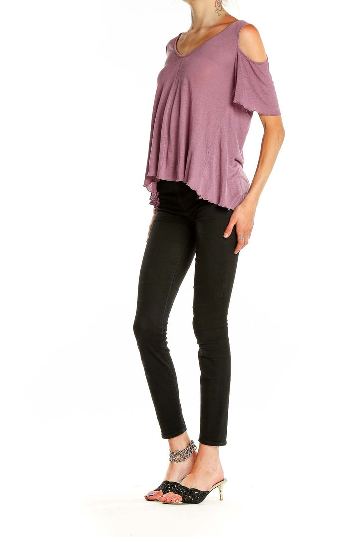 Front view of Free People mauve cold-shoulder V-neck top on model