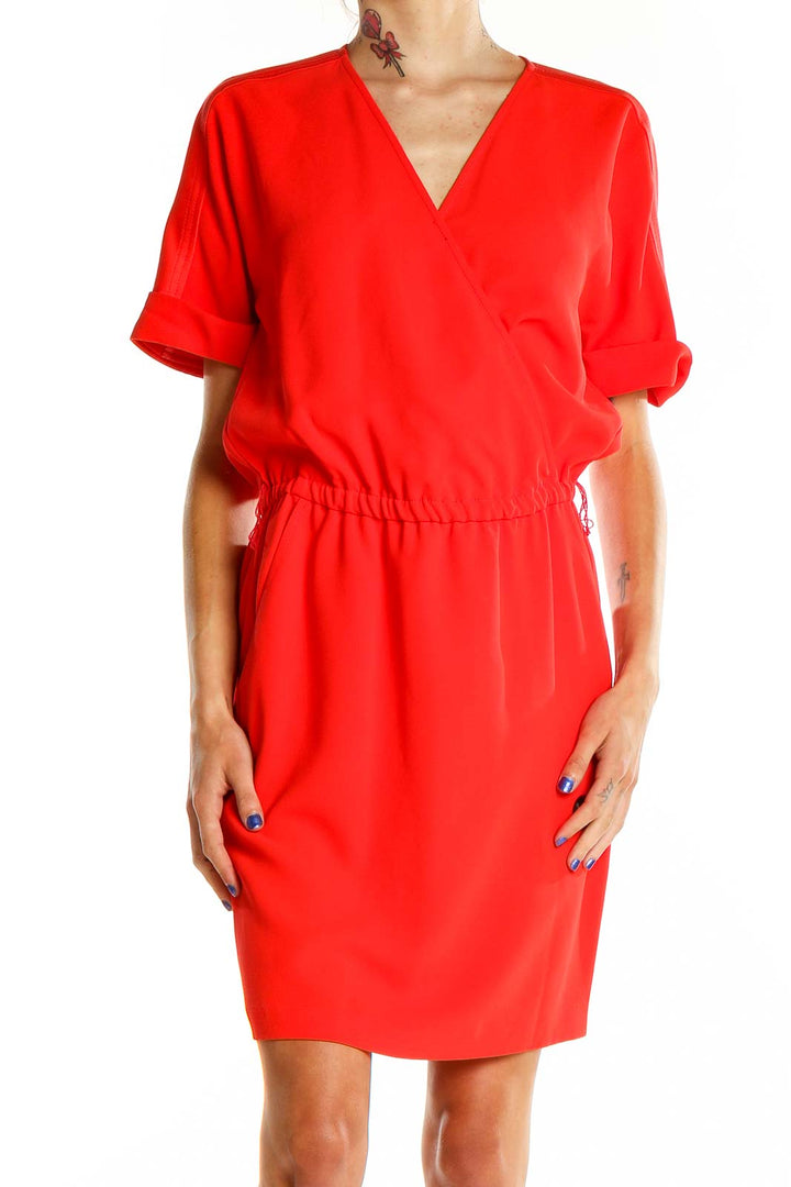 Front view of red Trina Turk wrap-style dress with V-neckline and elbow-length sleeves