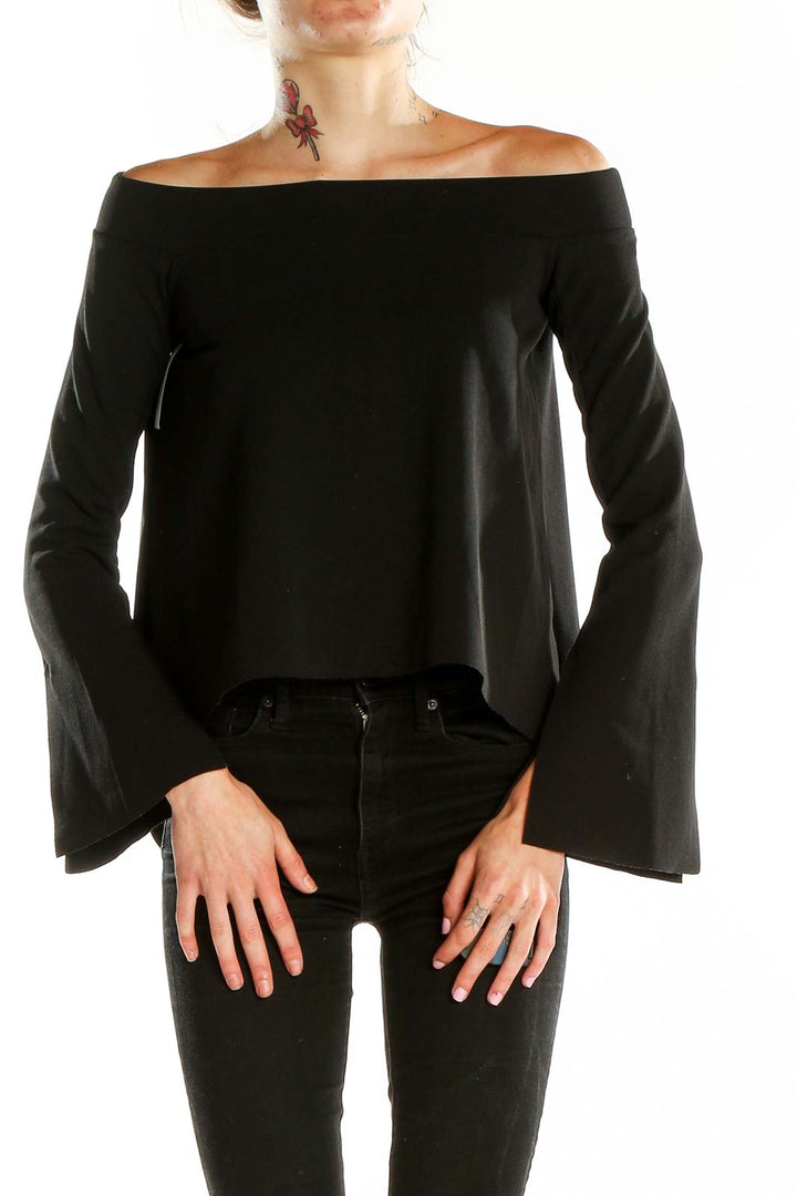 Front view of black off-shoulder bell sleeve top from Zara