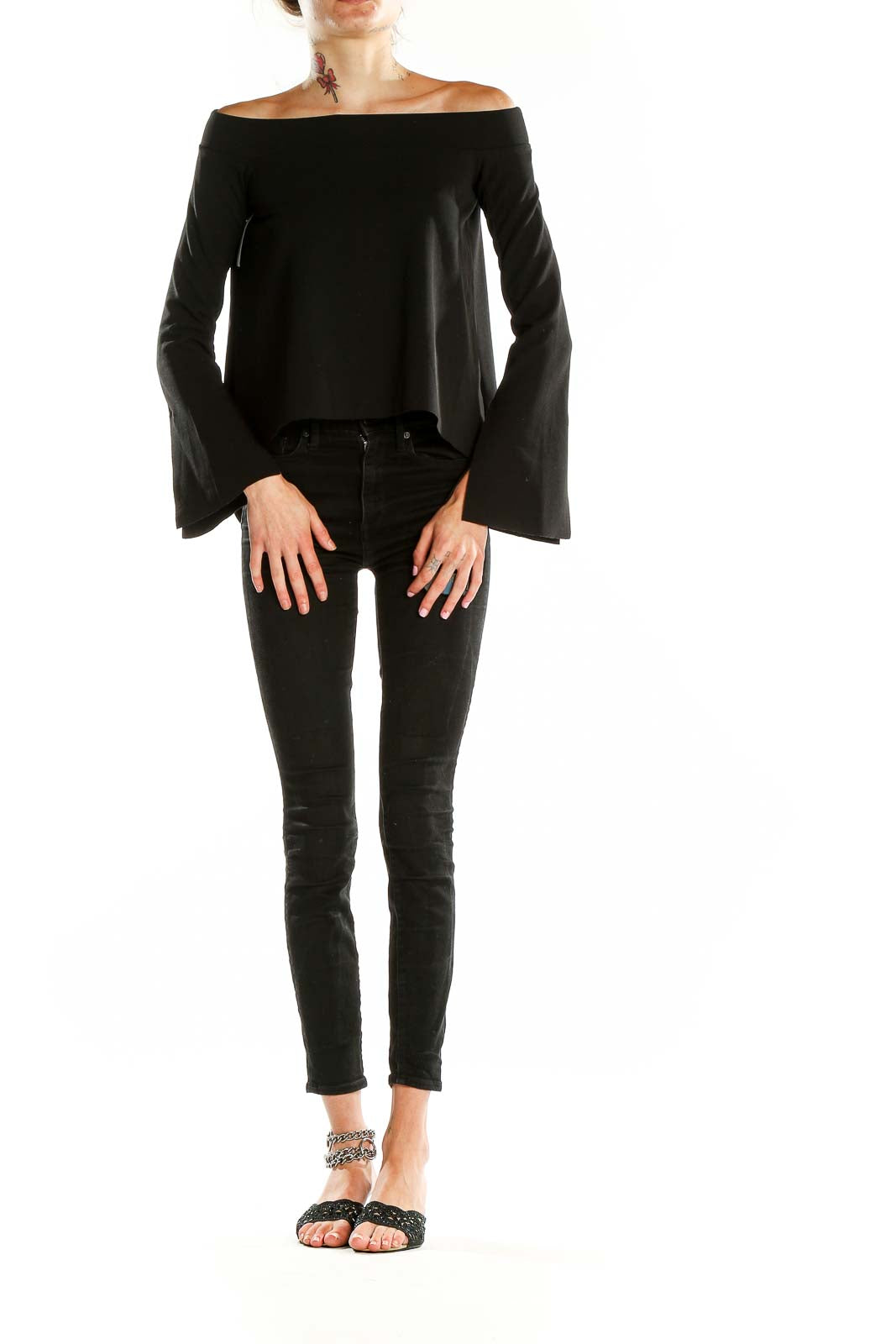 Front view of black off-shoulder bell sleeve top from Zara