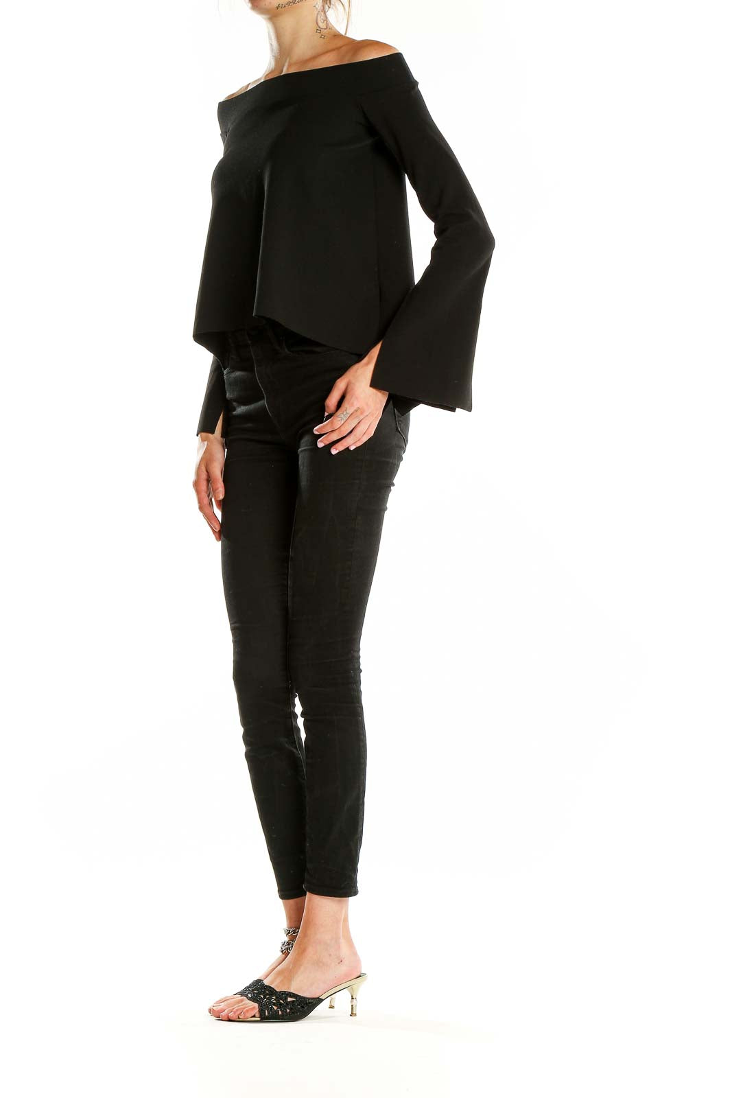 Front view of black off-shoulder bell sleeve top from Zara