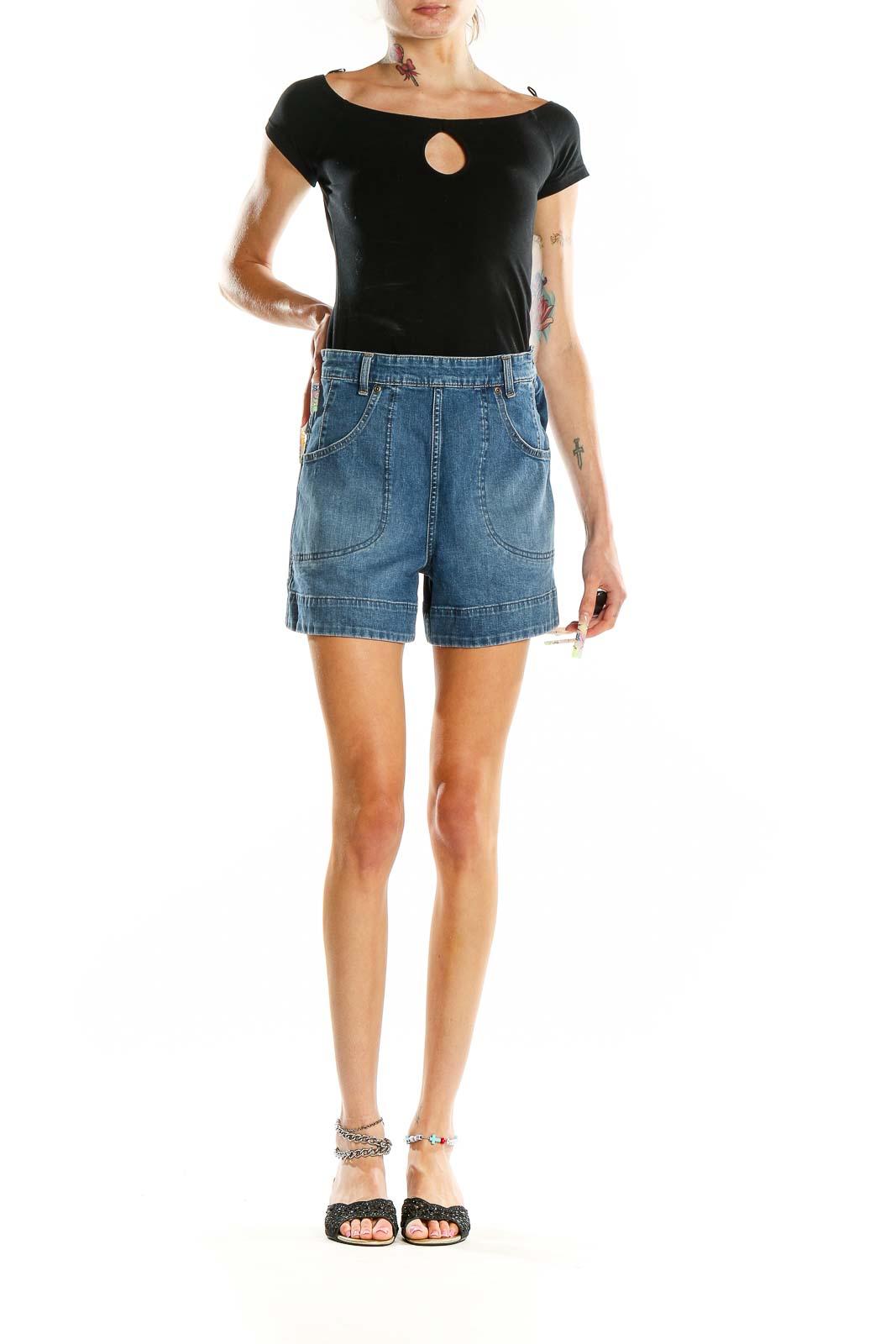 Front view of Lee blue denim high-waisted shorts on model