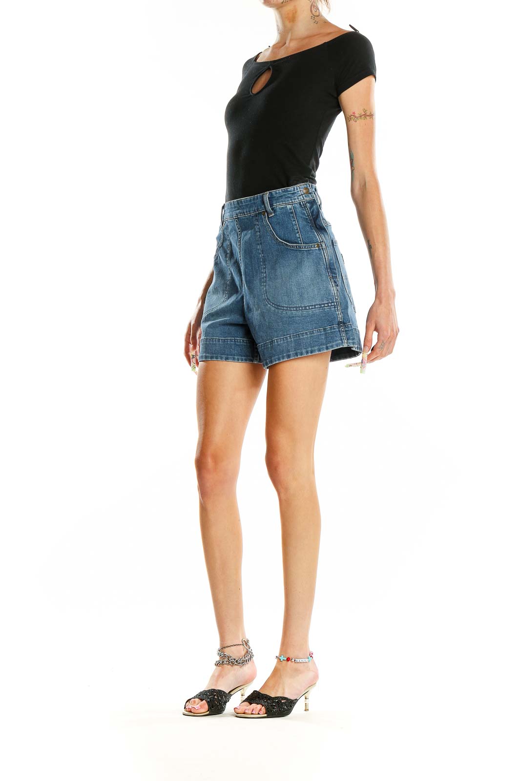 Front view of Lee blue denim high-waisted shorts on model