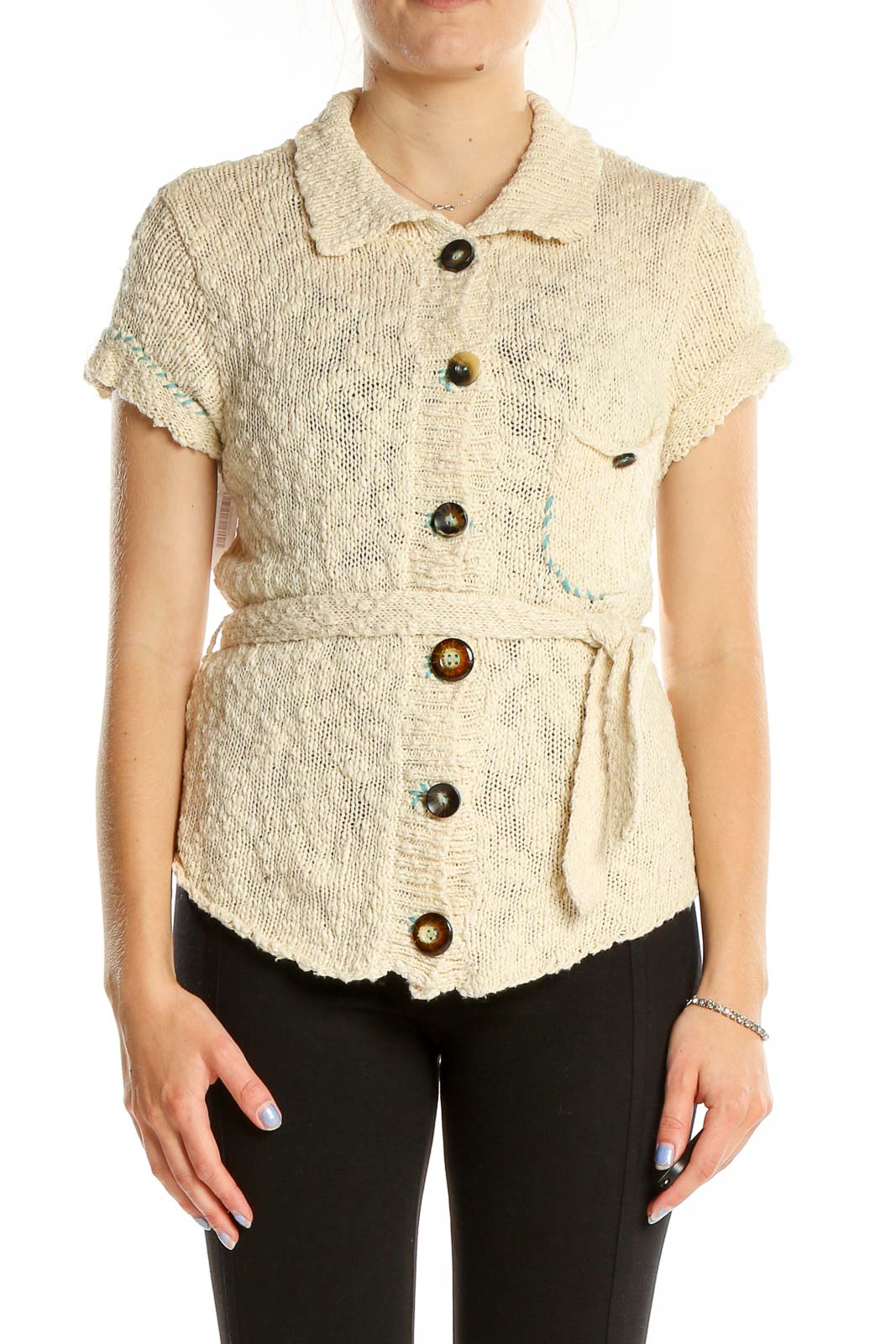 Front view of cream knit short-sleeve button-up cardigan from Free People