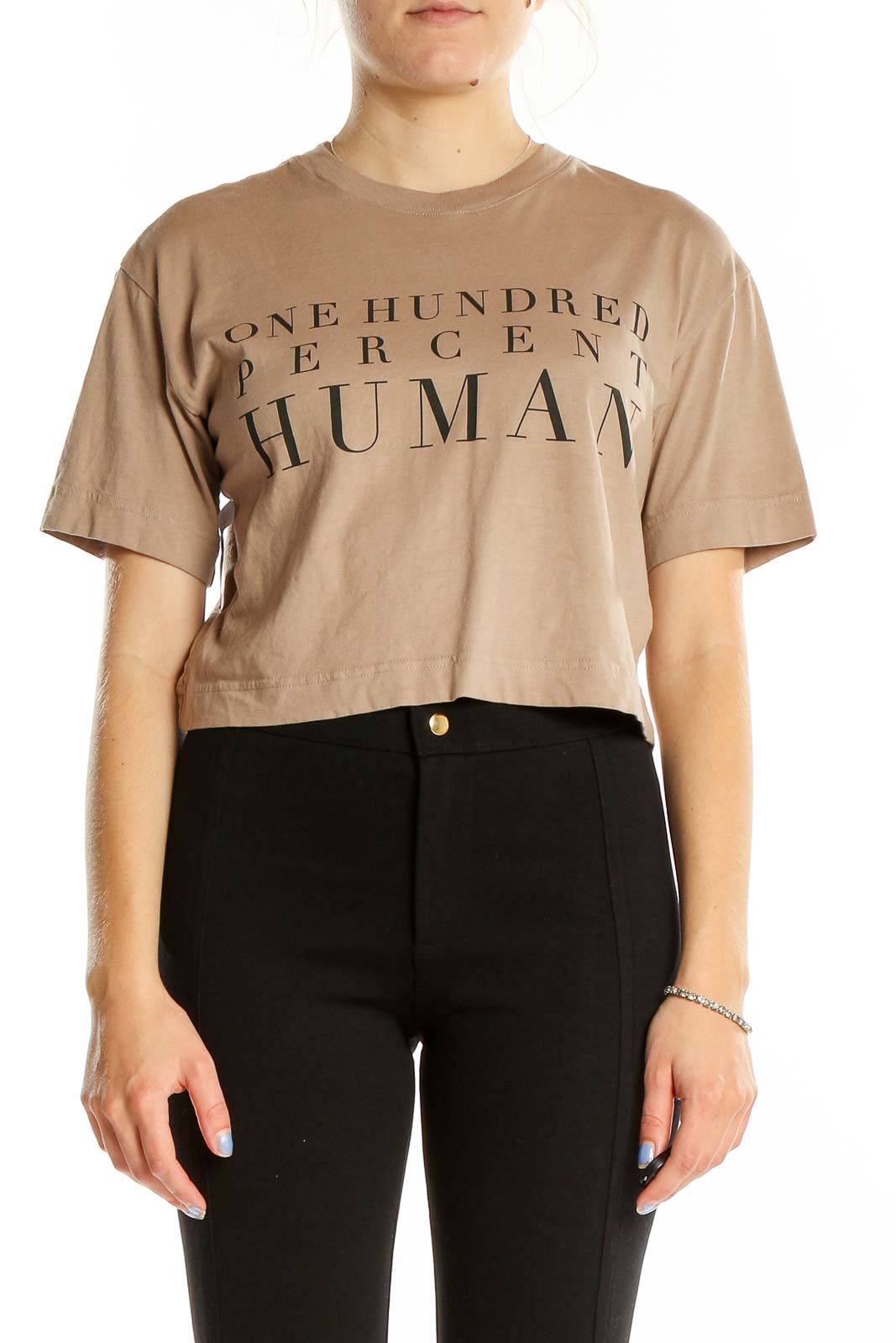 Front view of beige Everlane crop top with 'ONE HUNDRED PERCENT HUMAN' text