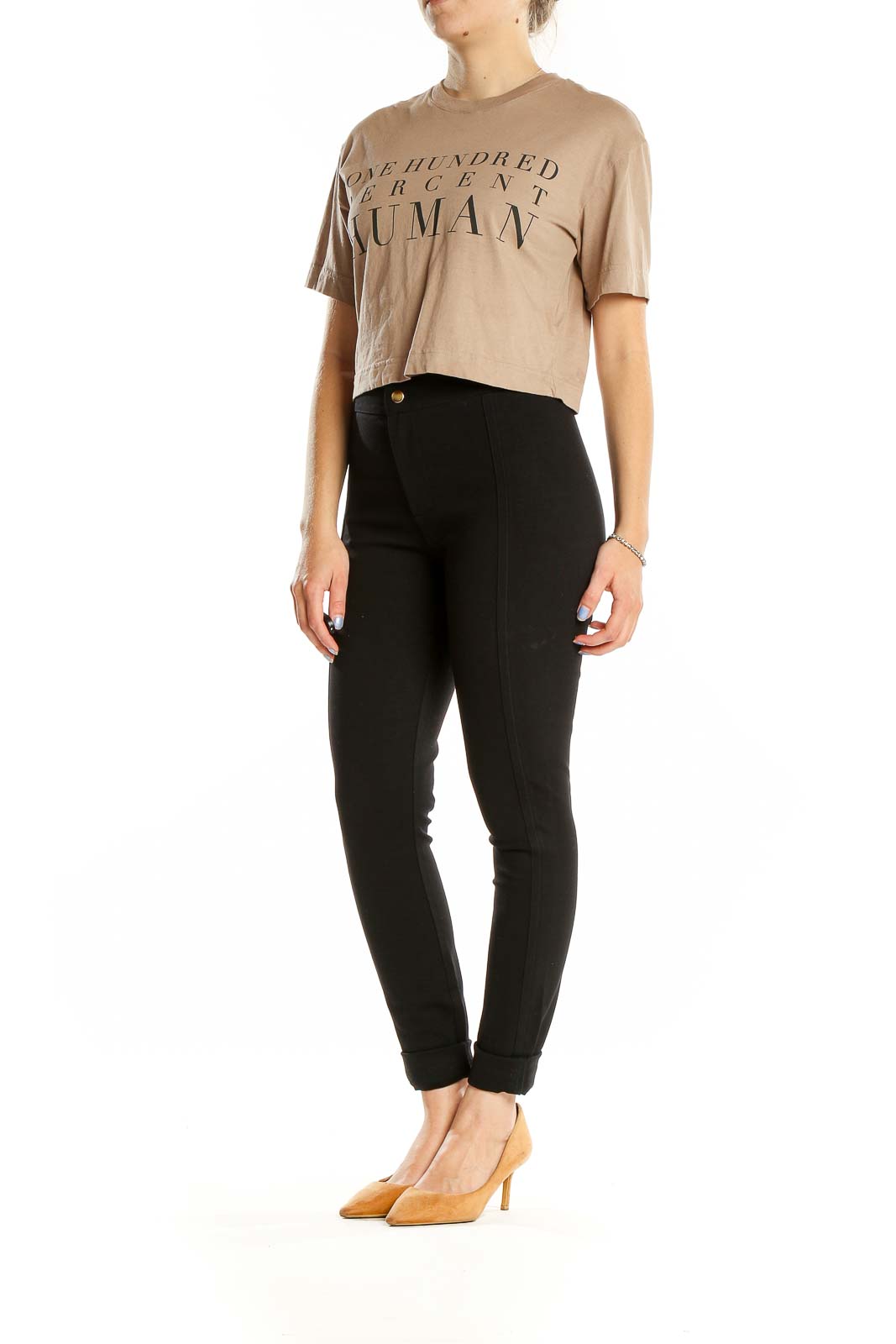 Front view of beige Everlane crop top with 'ONE HUNDRED PERCENT HUMAN' text