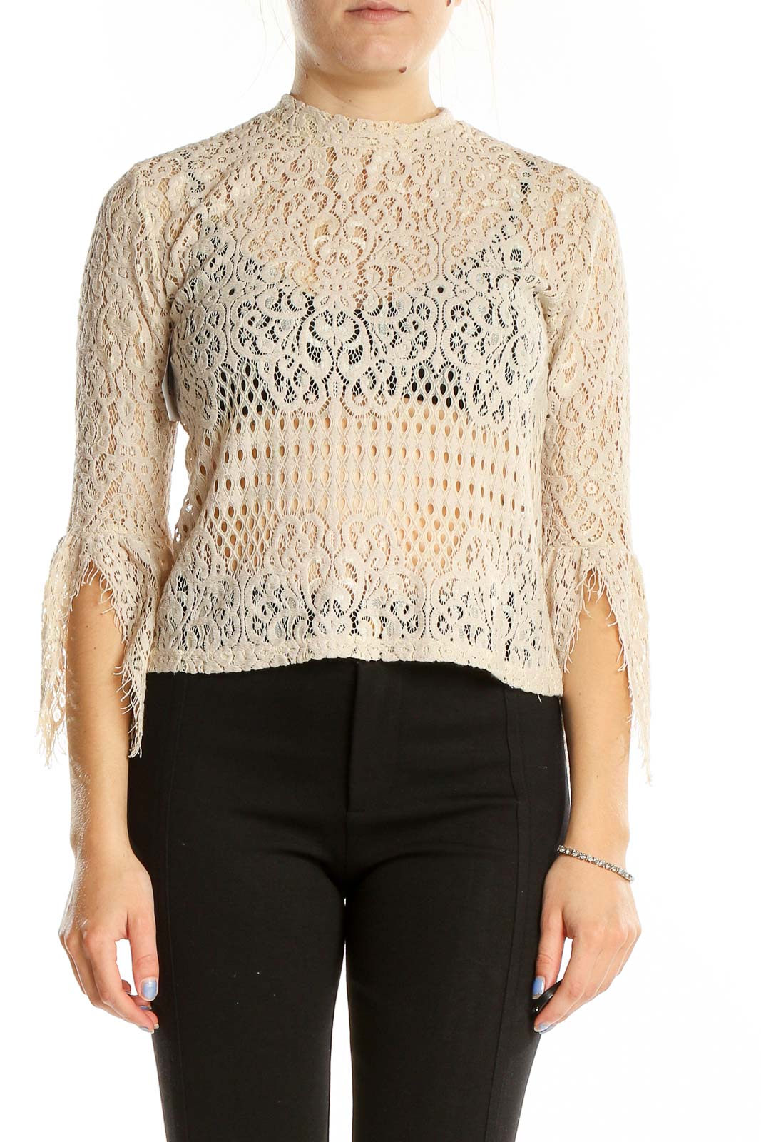 Front view of Zara beige lace crop top with mock neck and bell sleeves