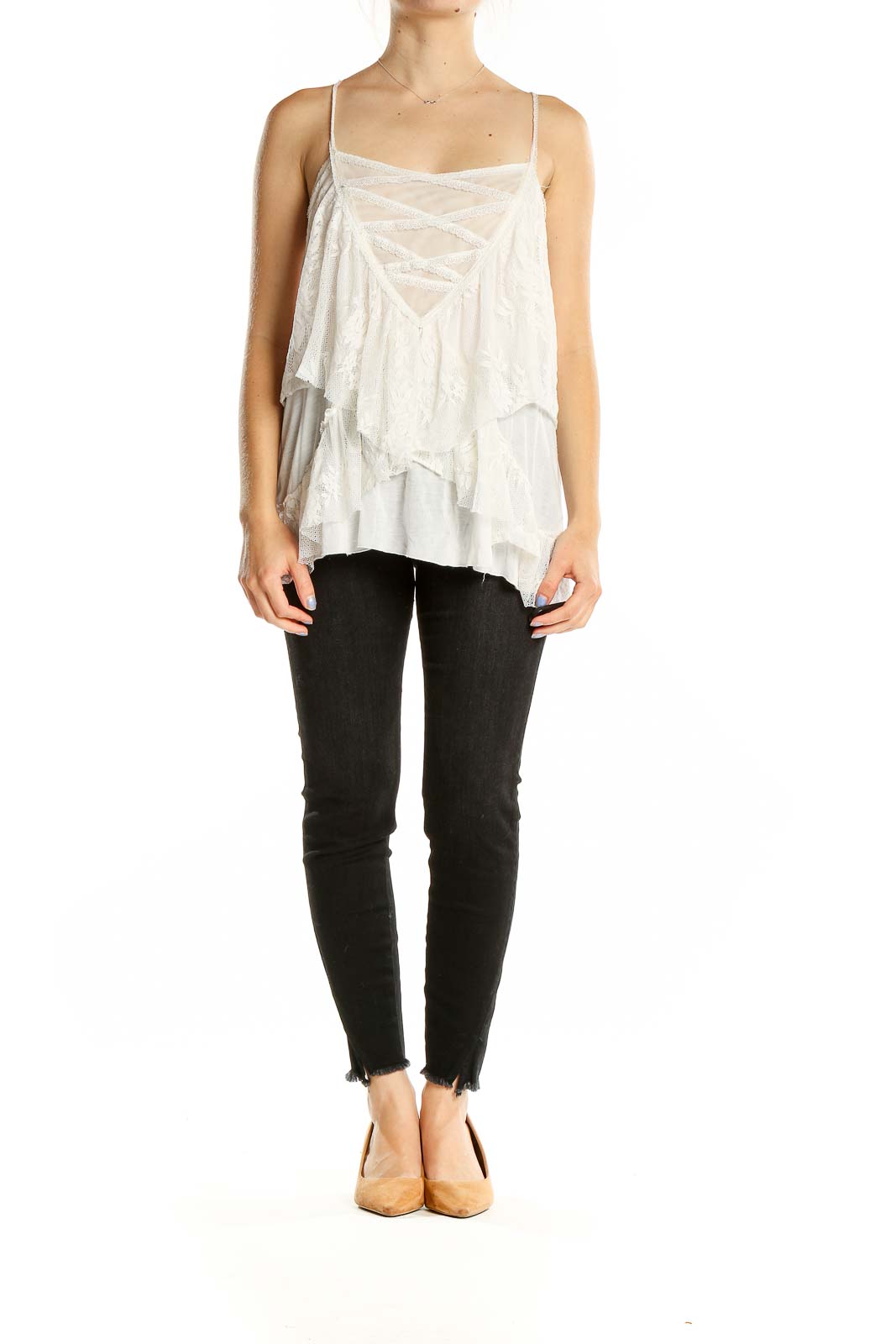 Front view of Free People white lace layered camisole top with crisscross detailing