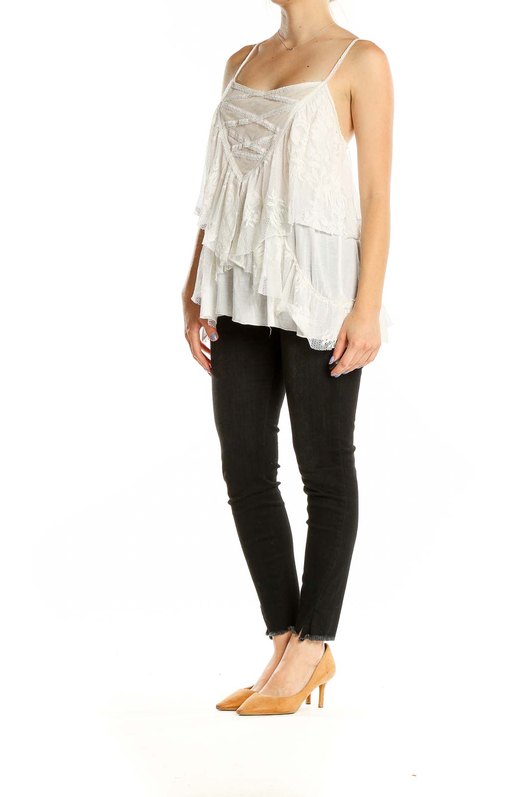 Front view of Free People white lace layered camisole top with crisscross detailing