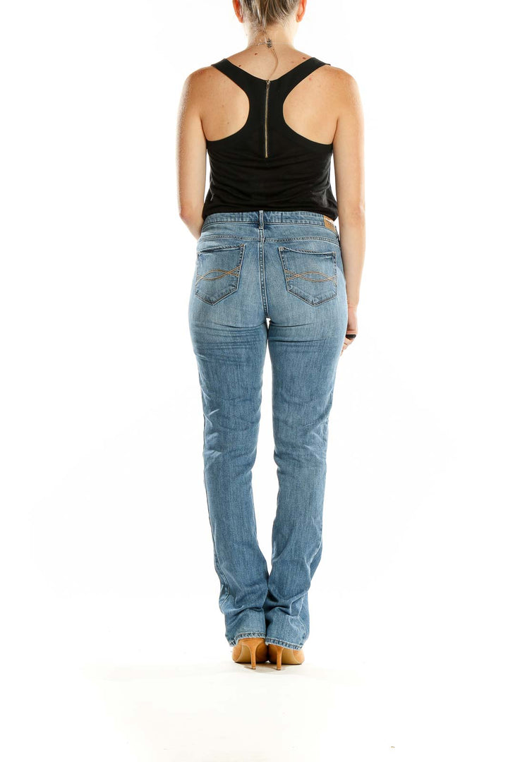 Back view of Abercrombie & Fitch light blue straight leg jeans on model