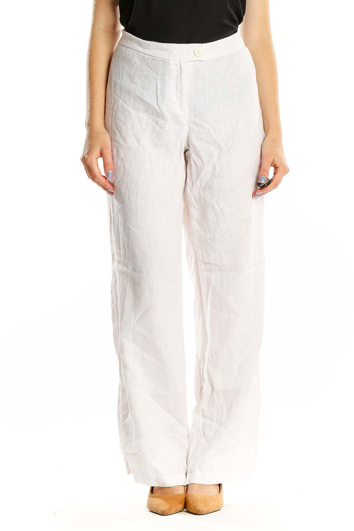 Front view of Tommy Bahama white linen wide-leg pants on model