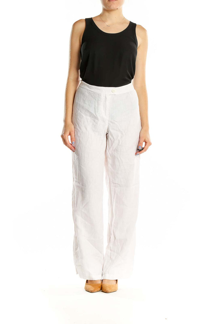 Front view of Tommy Bahama white linen wide-leg pants on model