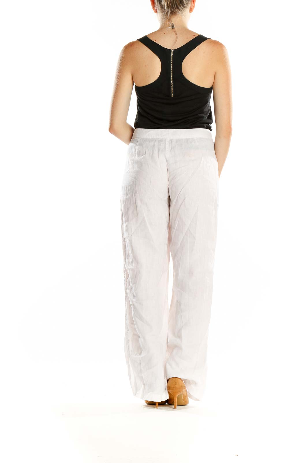 Back view of Tommy Bahama white linen wide-leg pants on model