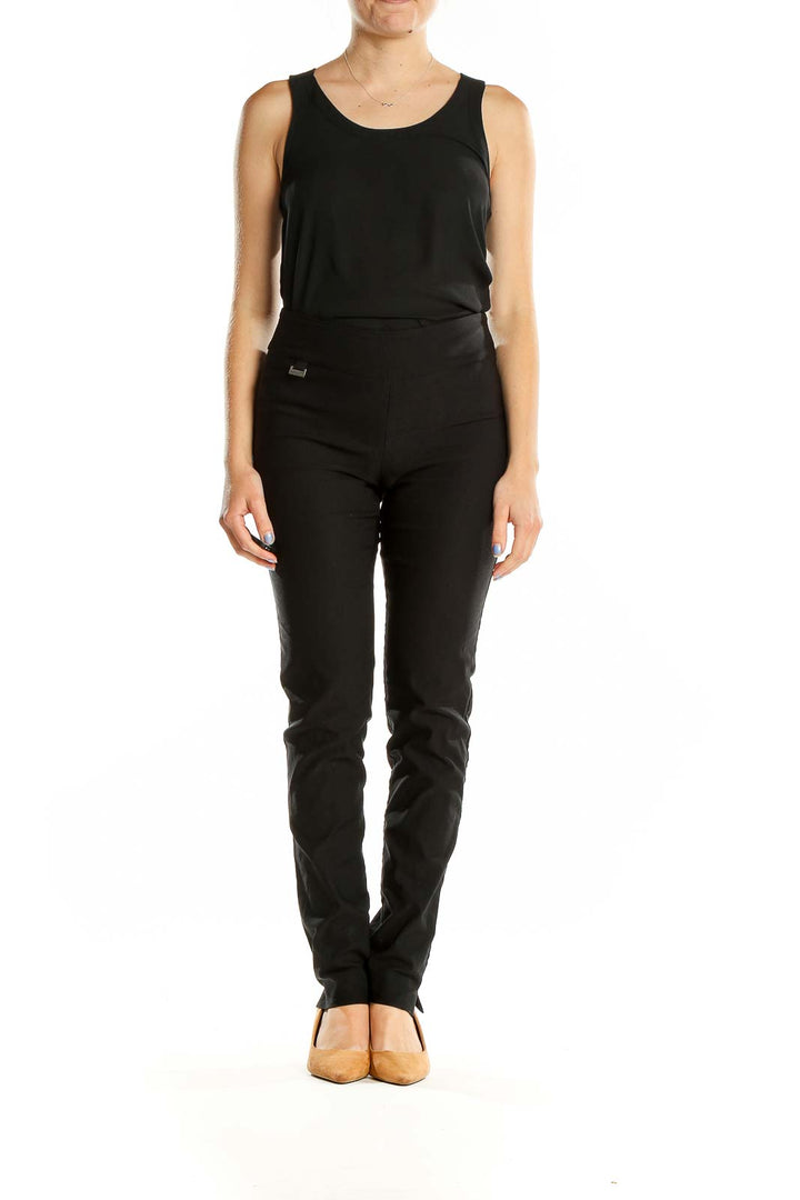 Front view of Joseph Ribkoff black slim fit dress pants on model