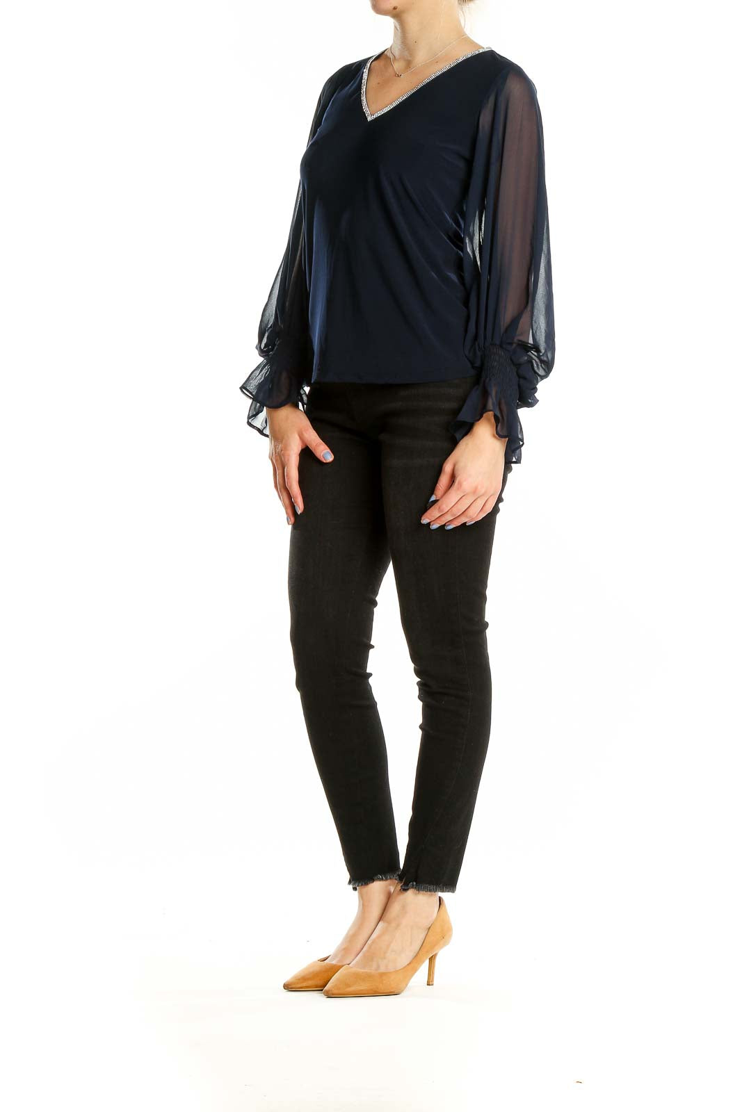 Front view of Vince Camuto navy top with sheer sleeves and V-neckline