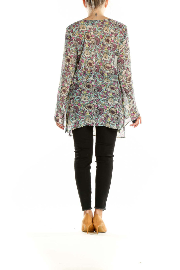 Back view of Nicole by Nicole Miller multicolor floral print tunic top showing long bell sleeves