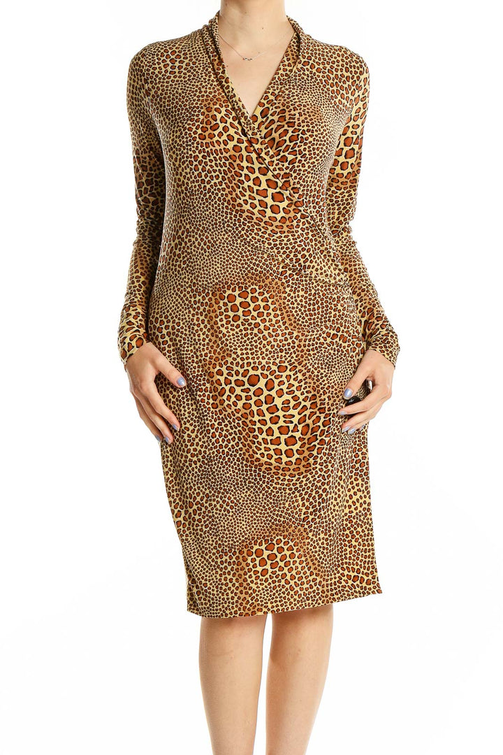 Front view of NORMA KAMALI brown animal print wrap dress