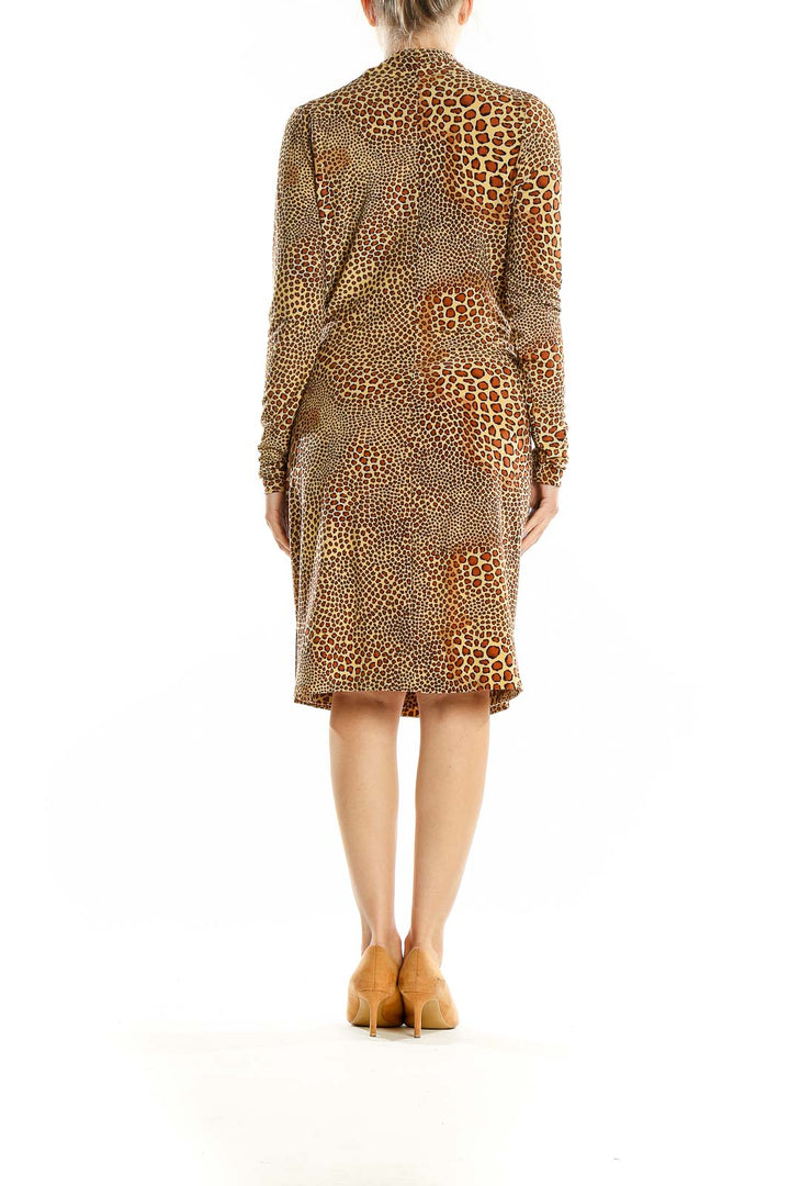 Back view of NORMA KAMALI brown animal print wrap dress