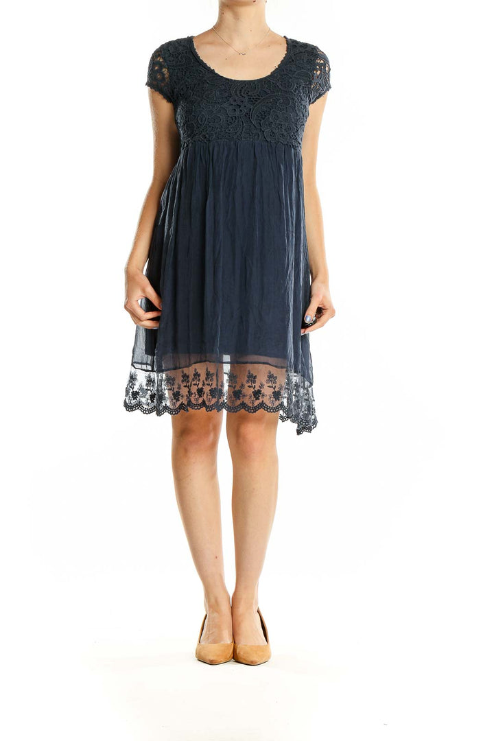 Front view of Piazza Roma navy lace bodice empire waist dress