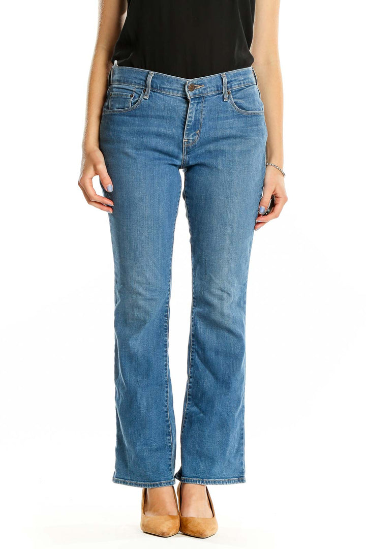 Front view of Levi's blue bootcut jeans on model