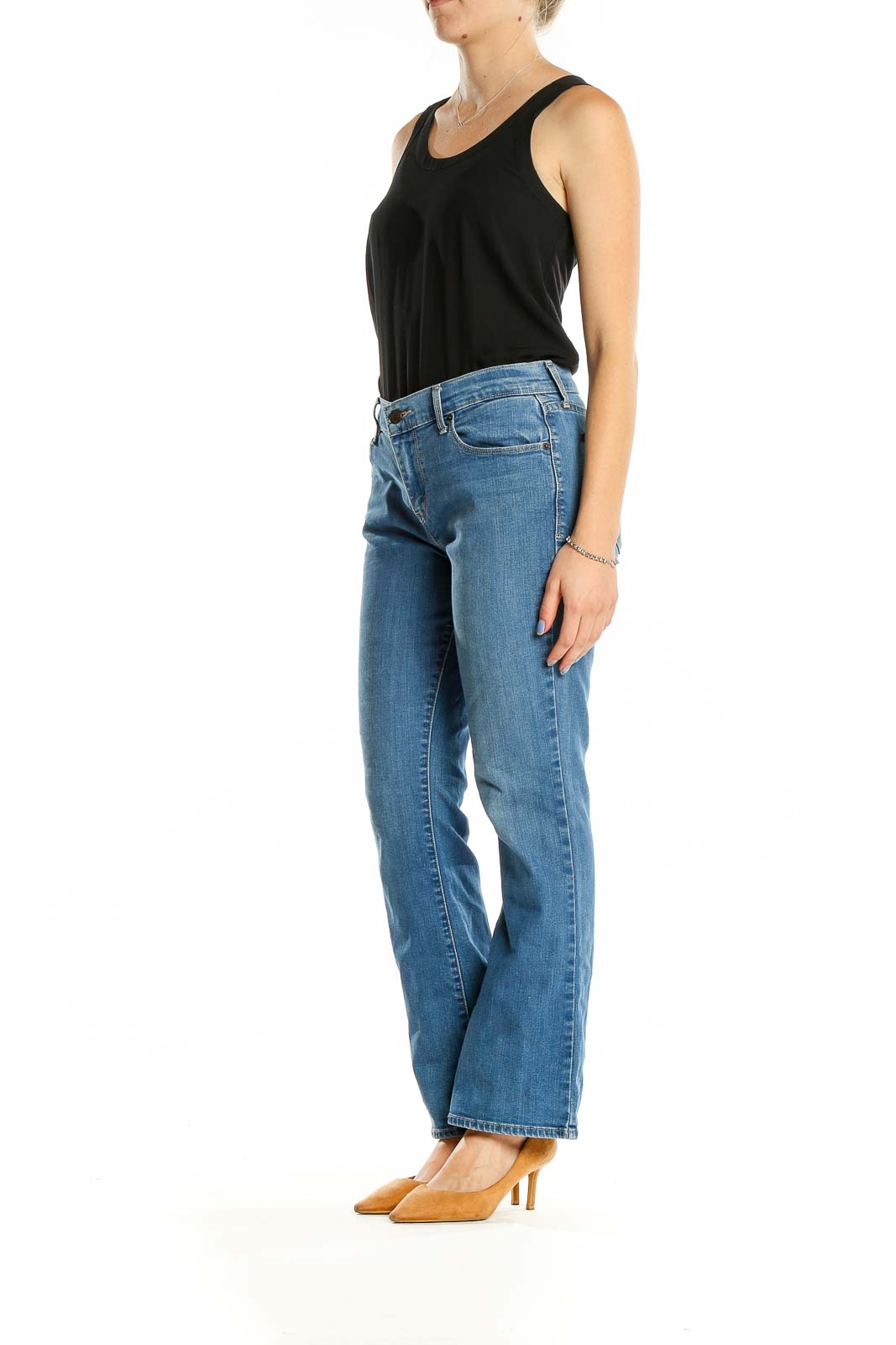 Front view of Levi's blue bootcut jeans on model