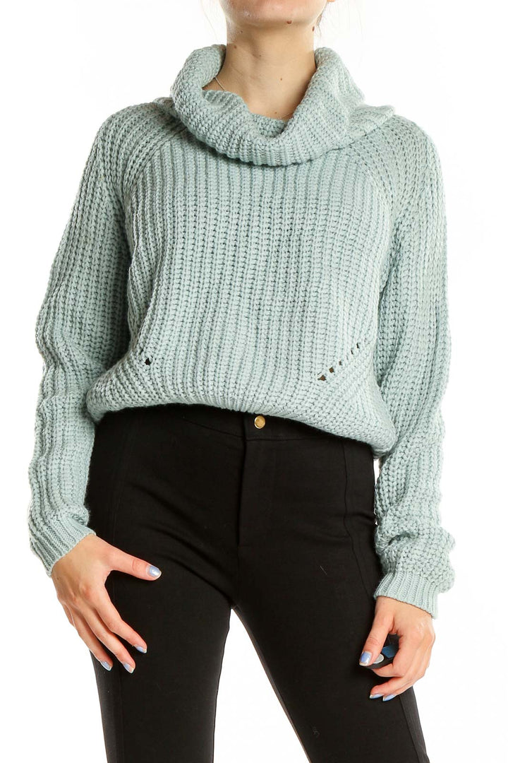 Front view of Moon+Madison mint green chunky knit turtleneck sweater on model