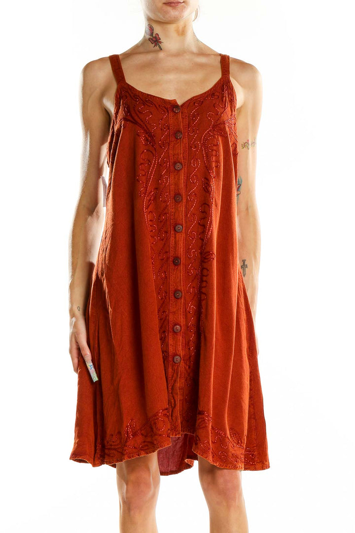 Front view of rust-colored JackPot sundress with embroidery and button-front design