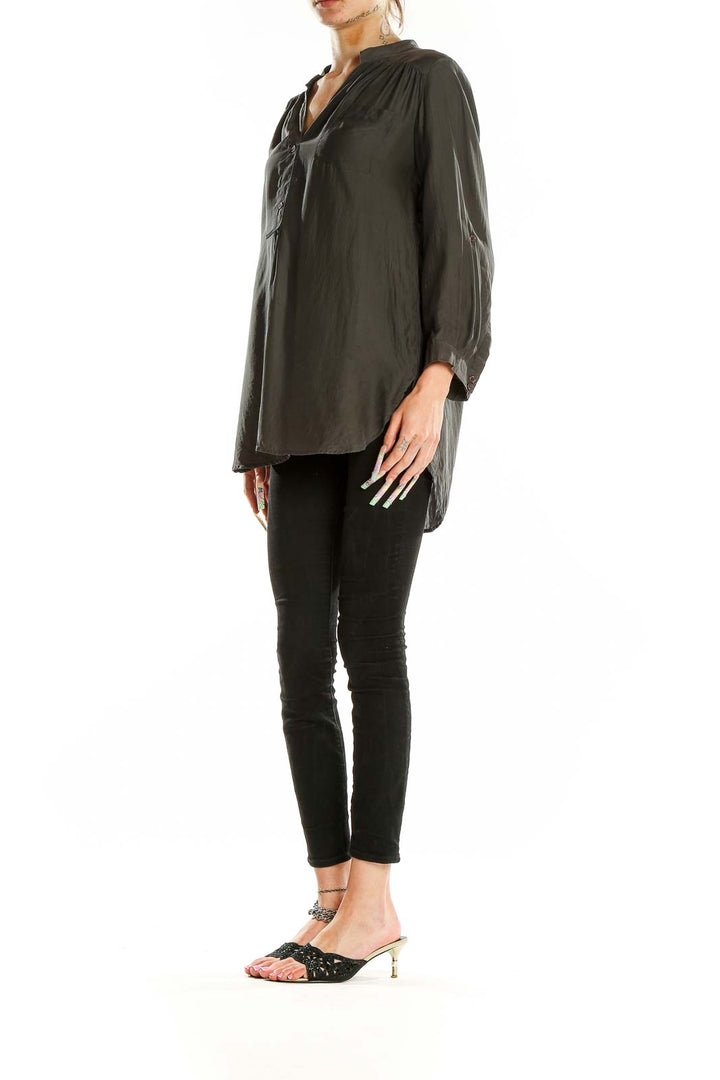 Front view of Bellatrix olive silk tunic top with V-neck and partial button-up